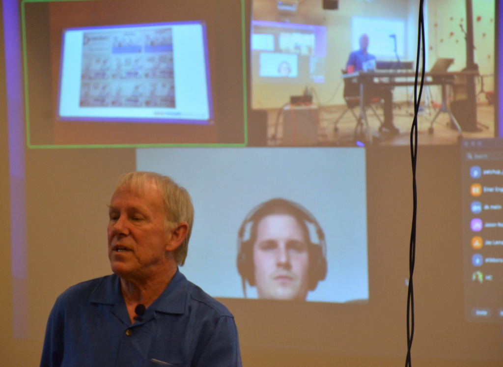 Photo of Dave Rossum lecturing about electronics at YorkU Patch Up! event held at the Re/Lab.